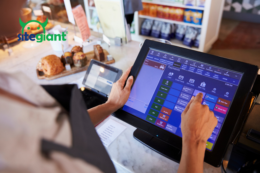 asian woman using POS system
