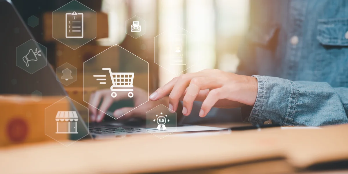 Business owner building a branded webstore to create a stronger customer experience and increase ecommerce sales performance.